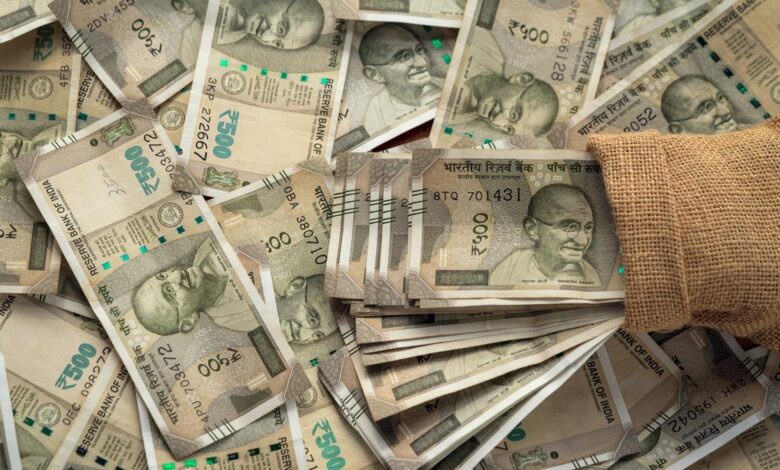Rupee slumps to record low past ₹94 per dollar, set for worst fiscal in more than a decade