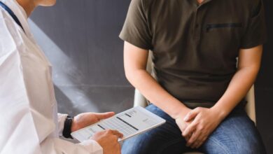Why do so many patients delay seeking help for urological symptoms