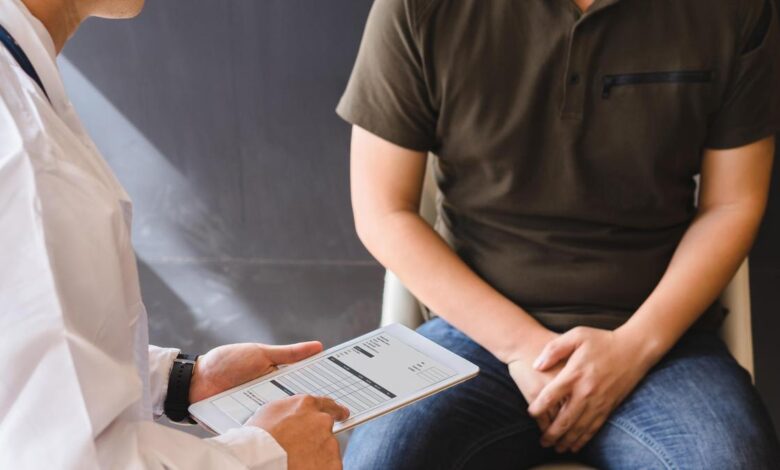 Why do so many patients delay seeking help for urological symptoms