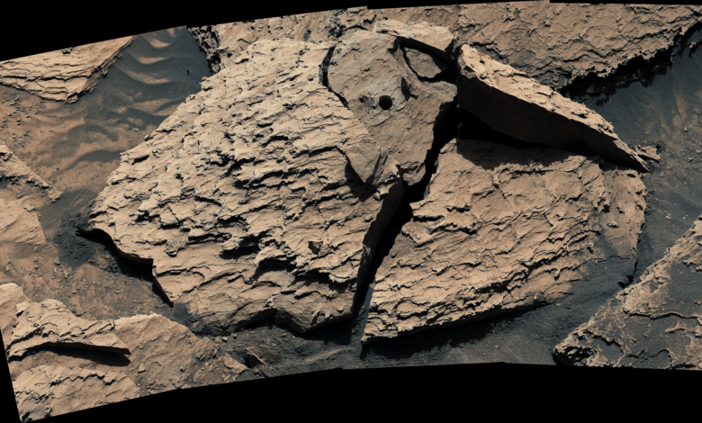 Curiosity Shakes Loose a Pesky Rock