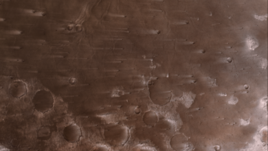 NASA’s Psyche Mission Spies Mars’ Wind-Blown Craters During Close Approach
